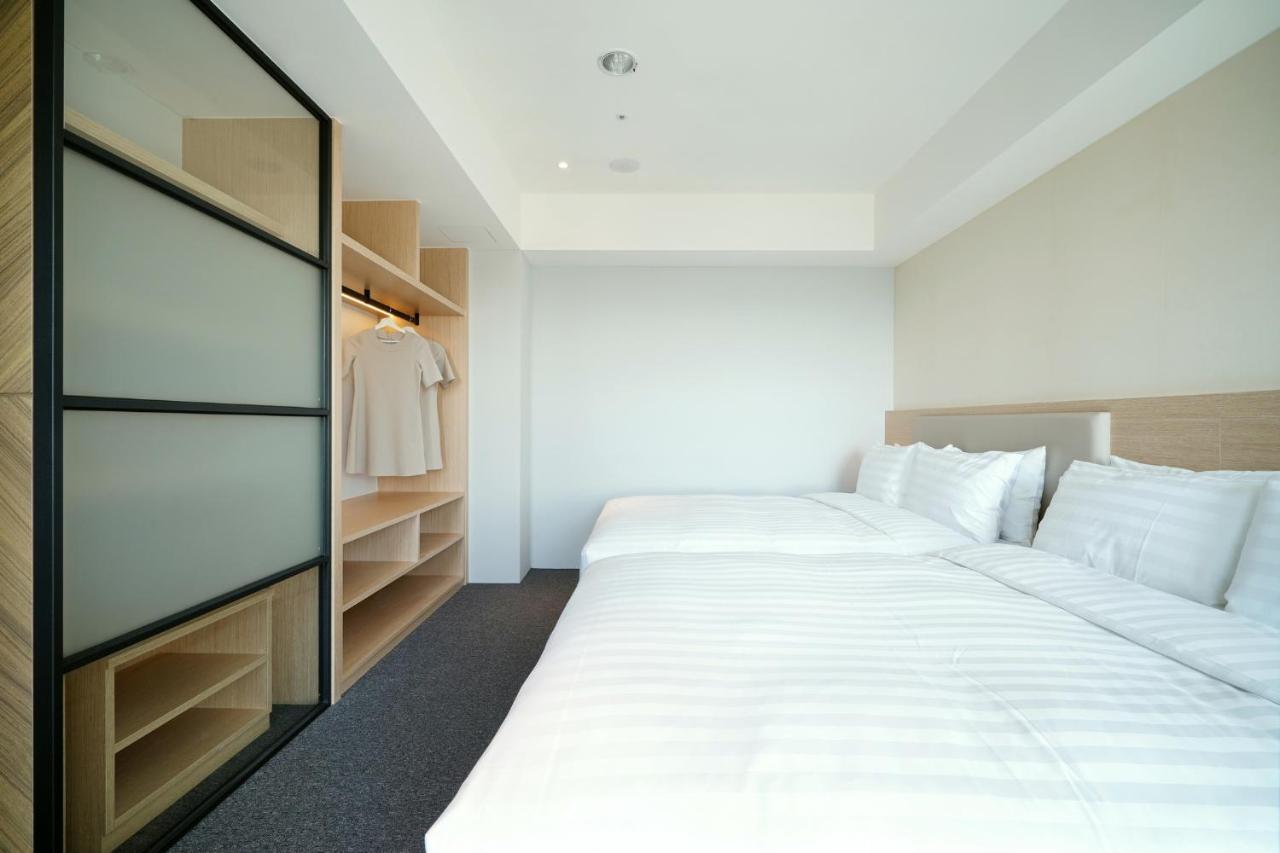 E Hotel Xinshi Extérieur photo