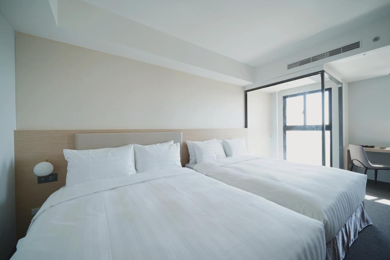 E Hotel Xinshi Extérieur photo