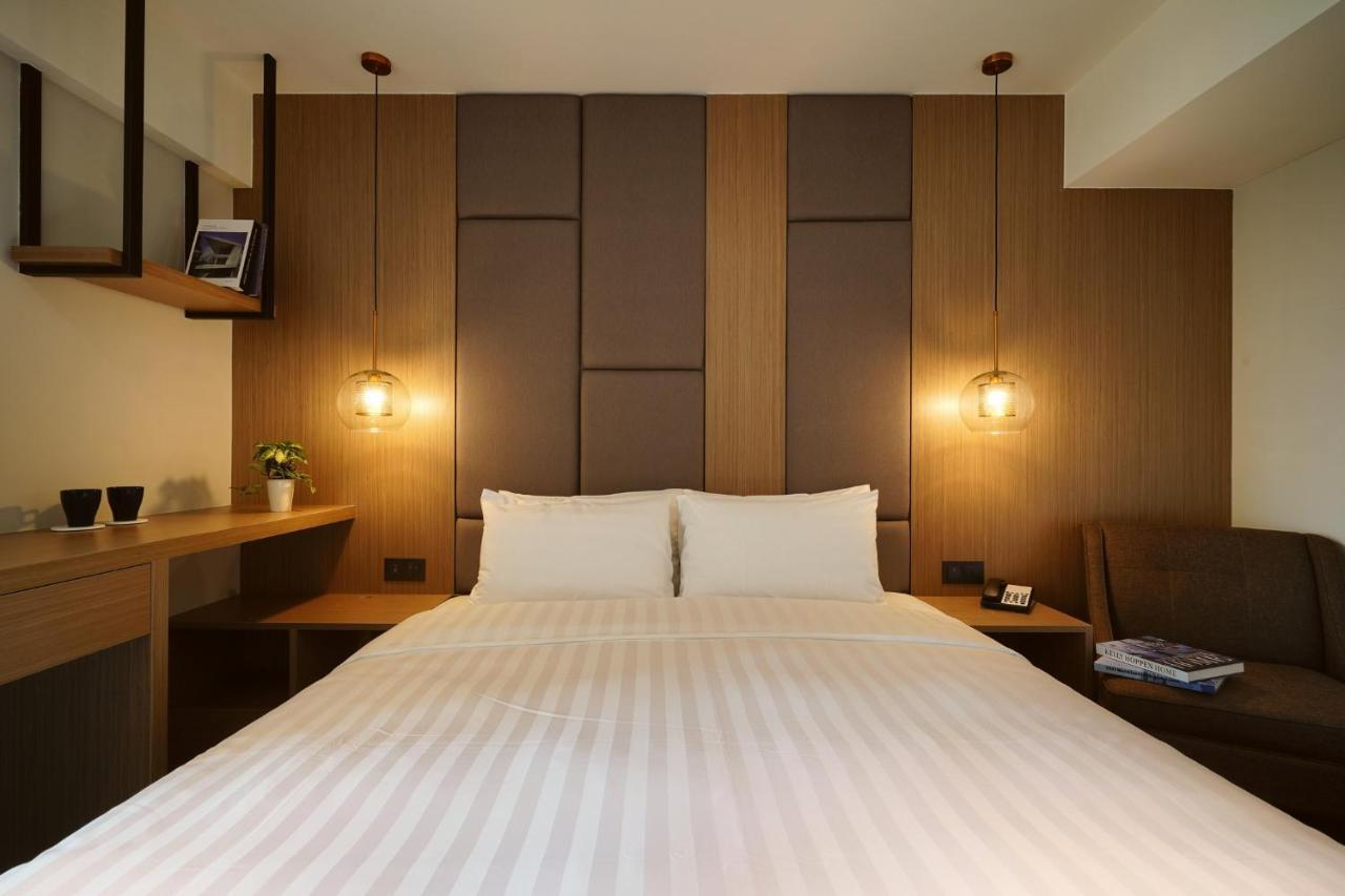 E Hotel Xinshi Extérieur photo